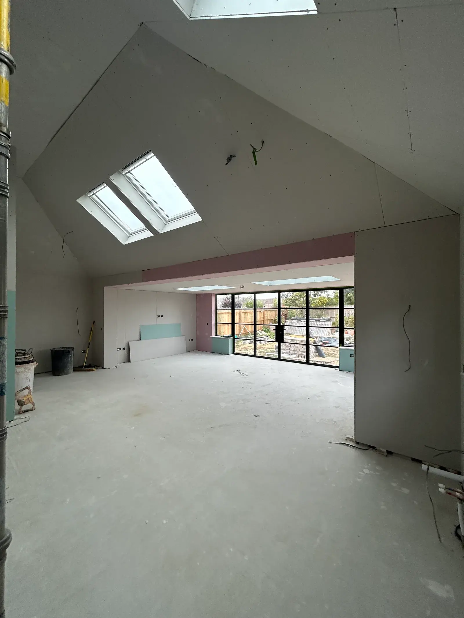 A Pearl-drylined vaulted extension ready for skim on a Dorset builder package